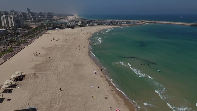 4K Slow Motion Drone Flight South Along Ashdod Coastline, Israel, Sea on the Right and City on the Left, HaKeshet Beach