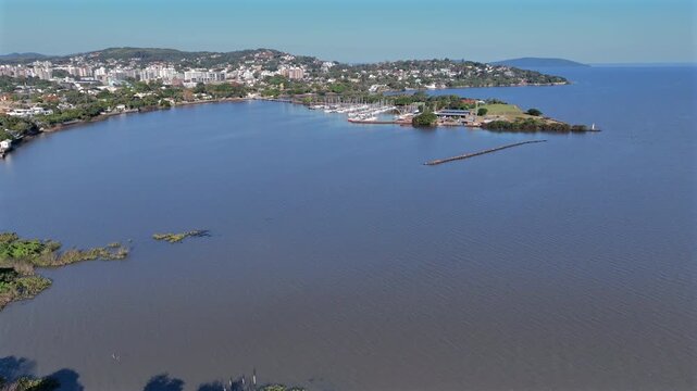 Porto Alegre Assun&ccedil;&atilde;o waterfront aerial showing Clube dos Jangadeiros island with sailboats docked at the marina