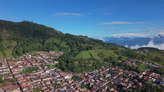 Aerial view of Jerico town with colorful rooftops and lush green hills in Colombia