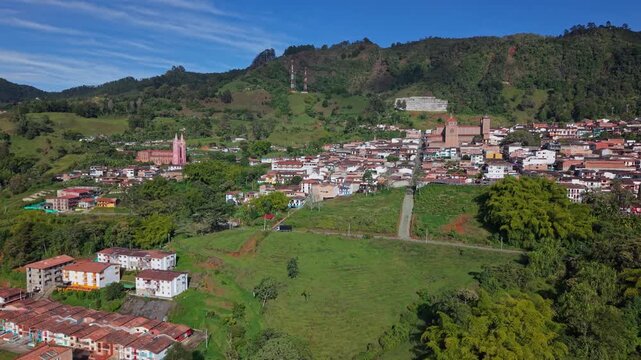 Aerial view of Jerico, Colombia with colorful colonial buildings and lush hills