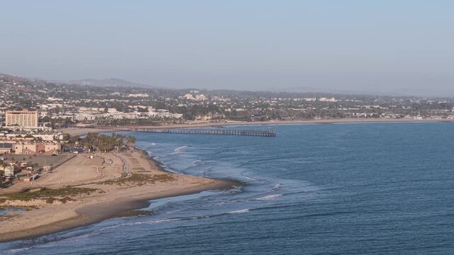 Downtown Ventura California, drone shot of pier. Wide shot of entire coastal town landscape looking south towards Oxnard.