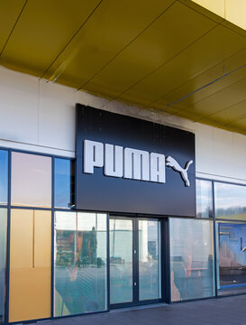 Puma sport brand logo on a fashion store building facade outdoor
