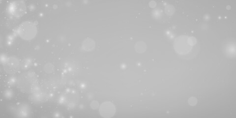 Soft sparkles drift through dark abstract space. Light particles form dreamy motion effect. Useful background PNG © Extrastock