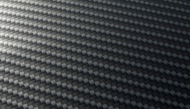 Close-up of woven carbon fiber texture in a gradient light setting.