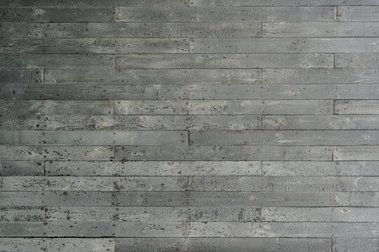 Top view grey old wooden floor texture background. Wood plank surface texture background. Gray wood wallpaper for sad and death. Timber wooden wall texture background. Interior design. Weathered wood.