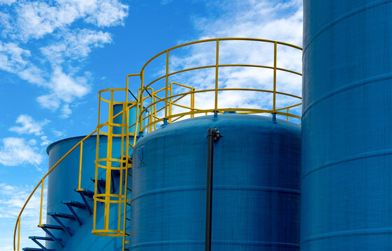 Closeup fuel storage tank in petroleum refinery. Blue big tank of oil storage. Fuel silo. Liquid petroleum tank. Petroleum oil industrial. Fuel station. Oil refinery plant. Petrochemical industry.