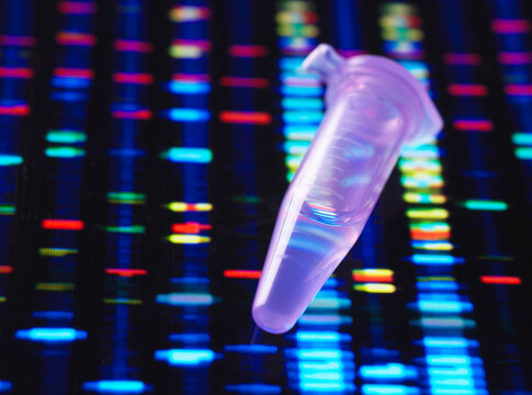 Pink lab tube on a colorful genetic sequence background.