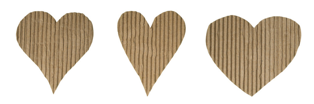 Scrapbook template hearts symbol set collecion - 3 brown heart shapes made of corrugated cardboard paper, kraft paper, craft paper, isolated on transparent or white background