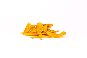 Fototapeta premium A small pile of crispy ridged potato chips seasoned with spices, isolated on white background