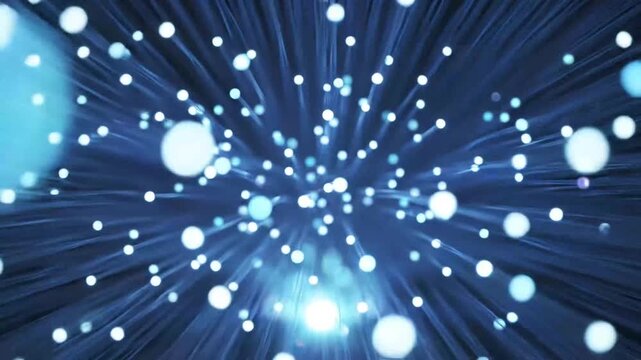 Glowing blue particles explode outward in a mesmerizing display of light and energy.