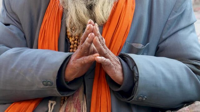 Elderly Hindu Sadhu Offering Namaste Gesture Symbolizing Respect Devotion And Spirituality