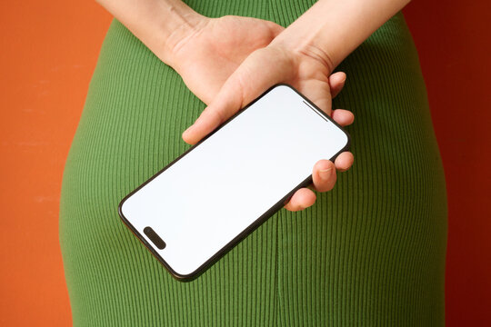 Hands holding smartphone