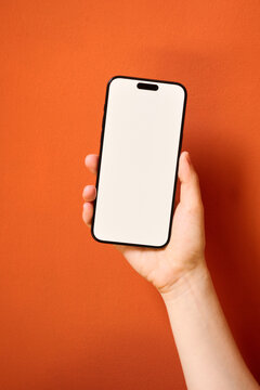 Hand holding smartphone
