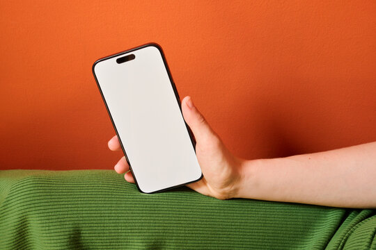 Hand holding smartphone
