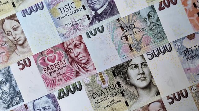 Czech paper money, koruna or crown, in various denominations for financial exchange and settlements. Czech koruna as a financial background for your design