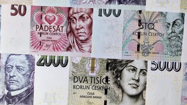 Czech paper money, koruna or crown, in various denominations for financial exchange and settlements. Czech koruna as a financial background for your design