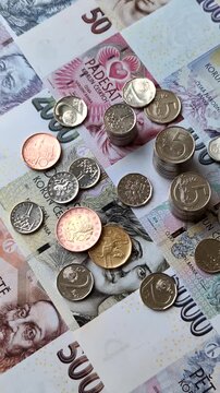 Czech paper money, koruna or crown, in various denominations for financial exchange and settlements. Czech koruna as a financial background for your design