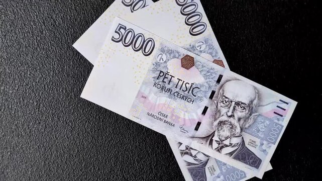 Czech paper money, koruna or crown, in various denominations for financial exchange and settlements. Czech koruna as a financial background for your design