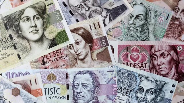 Czech paper money, koruna or crown, in various denominations for financial exchange and settlements. Czech koruna as a financial background for your design