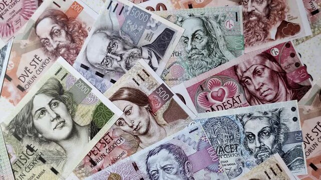 Czech paper money, koruna or crown, in various denominations for financial exchange and settlements. Czech koruna as a financial background for your design