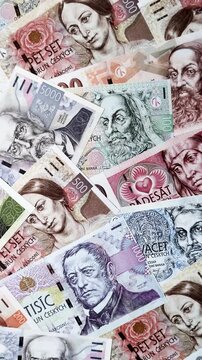 Czech paper money, koruna or crown, in various denominations for financial exchange and settlements. Czech koruna as a financial background for your design