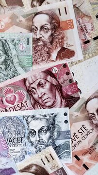 Czech paper money, koruna or crown, in various denominations for financial exchange and settlements. Czech koruna as a financial background for your design
