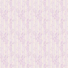 Seamless vintage floral pattern with delicate wildflower sprays and stars on pastel lavender and pale yellow vertical stripes. Romantic folk art design for textile, fabric, wallpaper, wrapping paper © NKTN