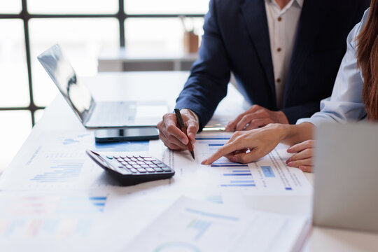 Hands and graphs on tablet screen for finance results, profit growth and budget review. Staff, team and digital with financial report, revenue stats and dividend comparison of risk assessment
