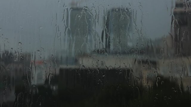  Wet glass texture background. Water droplets on a window glass in rainy weather.