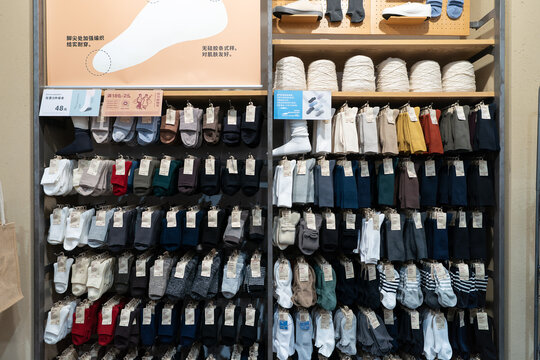 Socks displayed inside Muji store at iN City Park