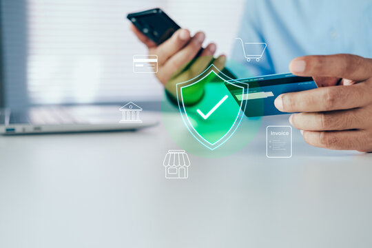 Mobile payment with wallet app. paying and shopping with smartphone. Secure Online Payment Transaction technology, Man holding credit card, smartphone with digital shield icon, Digital money transfer