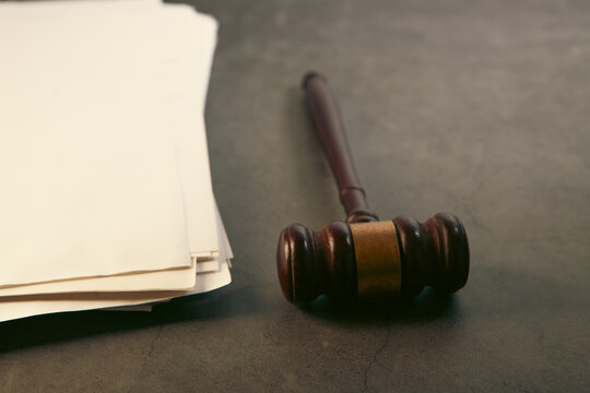 judge gavel and blank paper on table, law concept