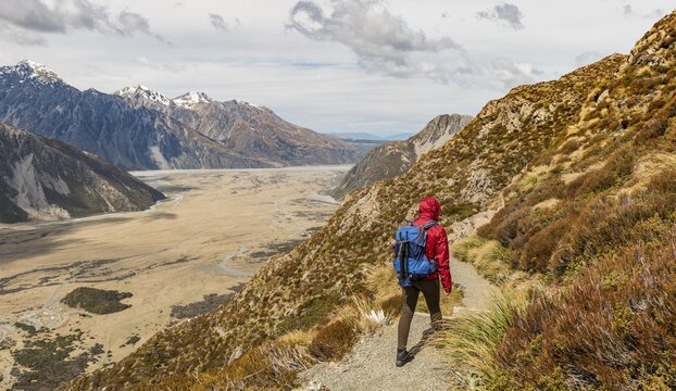 Hiker, View into the Hooker Valley from Sealy Tarns Track, Mount Cook National Park, Canterbury Region, South Island, New Zealand