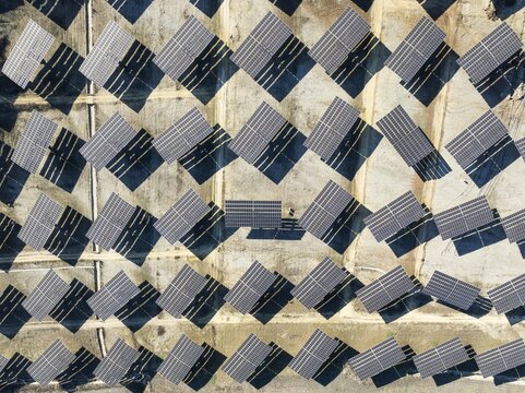 Rows of solar panels at a photovoltaic plant near Vejer de la Frontera. Aerial view. Drone shot. C&aacute;diz province, Andalusia, Spain