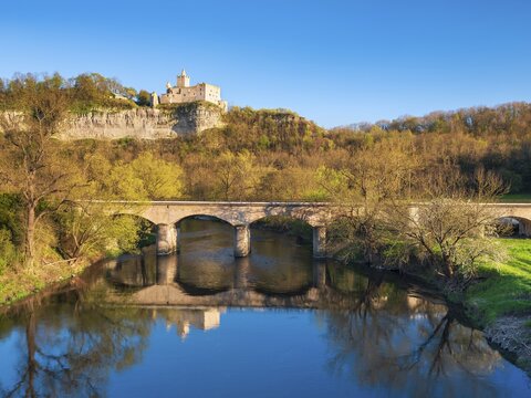 The ruins of Rudelsburg Castle and the bridge over the Saale in spring, Saale Valley near Bad K&ouml;sen, Naumburg, Saxony-Anhalt, Germany