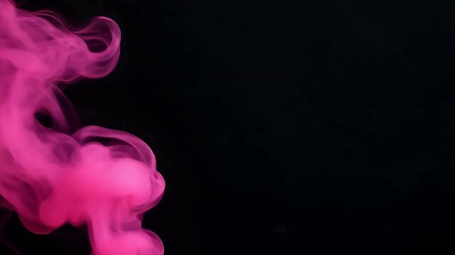 Vibrant pink smoke rising against a black background, creating dynamic and fluid patterns.