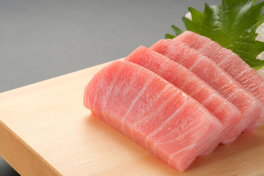 Bluefin chutoro slices on hinoki board