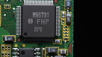 Fototapeta premium classic green motherboard with chipsets, memory modules, transistors and contacts