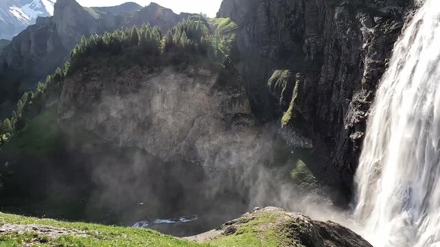 Dramatic Close-Up Drone View of Engstligen Waterfall Mist Spray and Cascade Bernese Oberland