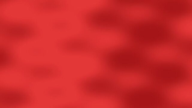 abstract red bokeh background with soft glow and texture