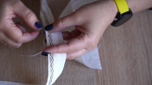 How to sew a simple seam by hand with clear steps and close-up views of stitching techniques. Traditional Ukrainian Embroidery