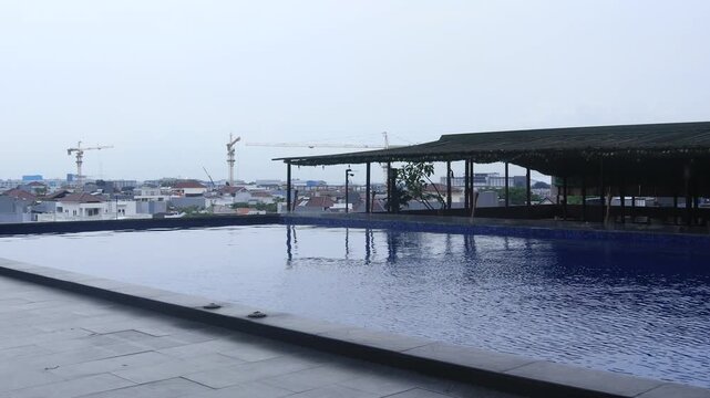 swimming pool on the 6th floor of a hotel in the city center
