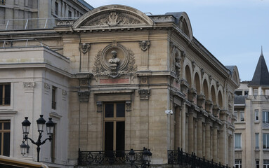 Obraz premium Classical/Neoclassical building façades, columns, pediments, Statues, Greco-Roman shapes and design, Ornaments... From this Architectural style inspired by Classical Antiquity. Mostly taken in Paris.