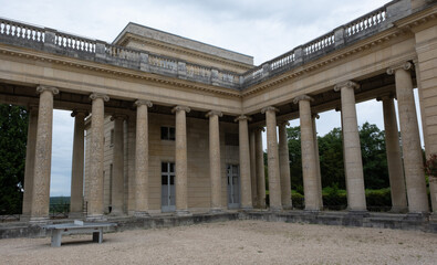 Fototapeta premium Classical/Neoclassical building façades, columns, pediments, Statues, Greco-Roman shapes and design, Ornaments... From this Architectural style inspired by Classical Antiquity. Mostly taken in Paris.