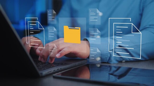 Professional businessman managing digital documents with folders on screen. Document management system (DMS), data security, secure files, and workflow automation concept.