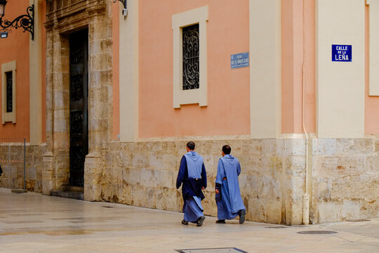 Two Priests Walking Along a Street in Valencia