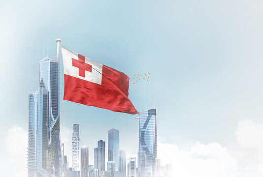 Tonga flag waving with modern futuristic buildings. Tonga national flag beautifully waving in the sky.