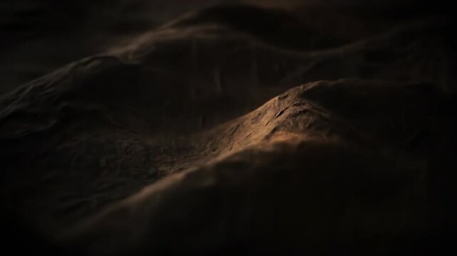 Close up cinematic view of an undulating dark textured surface resembling ancient parchment or weathered fabric close, material, eerie