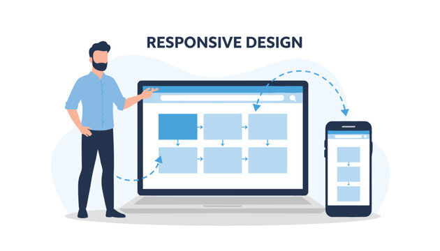 Web developer stands next to a laptop and a smartphone to demonstrate the concept of cross-platform responsive design.