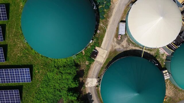 Aerial Biogas Plant Green Domes Solar Panels Rural Landscape